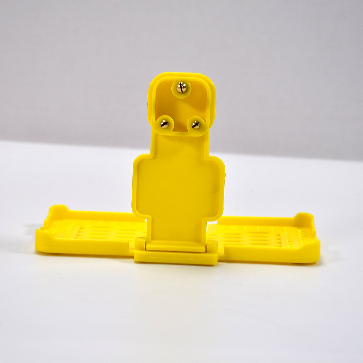 6496Y Multi-Purpose Wall Holder Stand for Charging Mobile Just Fit in Socket and Hang (Yellow) DeoDap 6496Y Multi-Purpose Wall Holder Stand for Charging Mobile Just Fit in Socket and Hang (Yellow) DeoDap